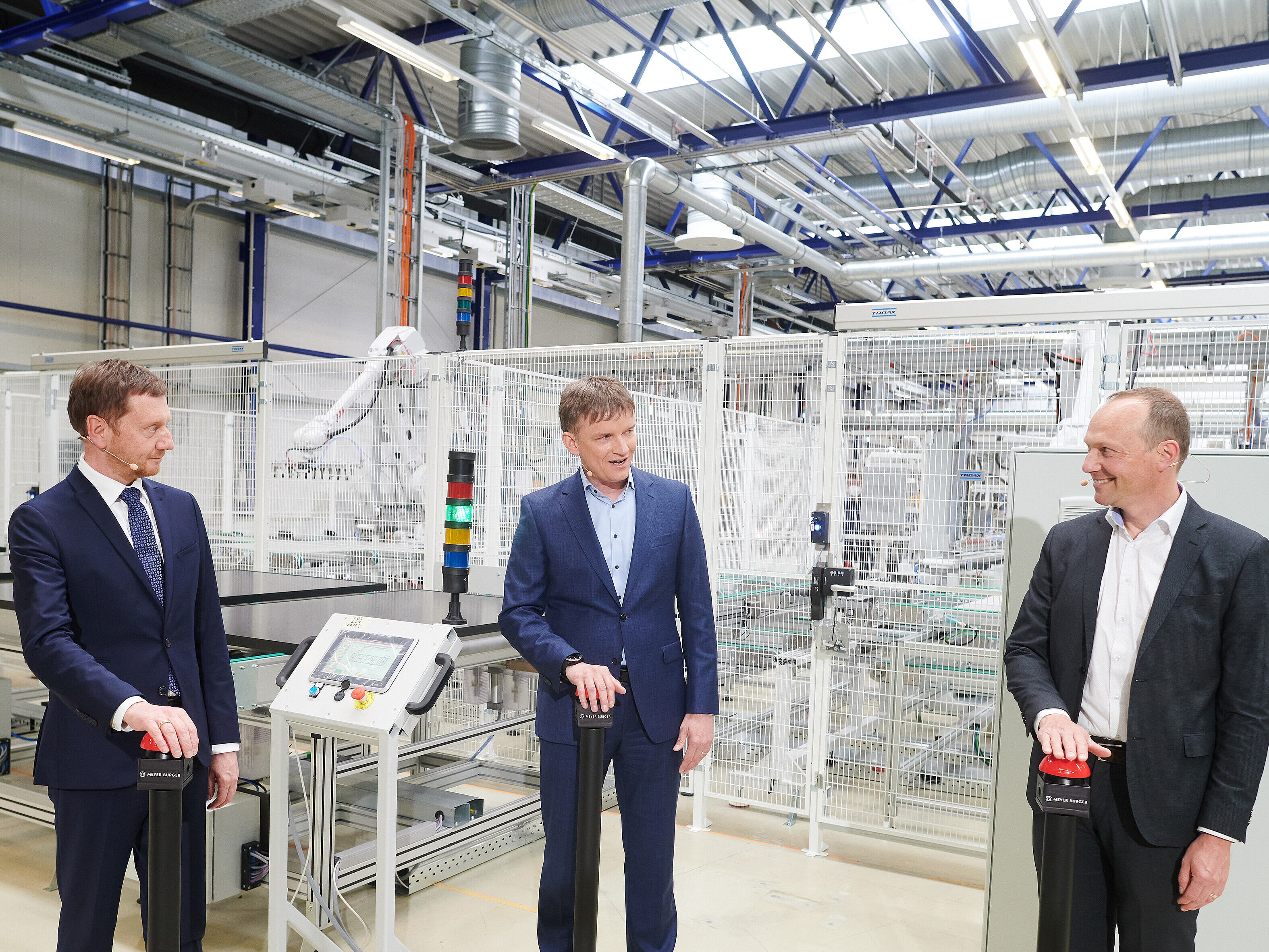 Opening of Europe's largest solar module plant in Freiberg with Saxony's Prime Minister Michael Kretscher, Meyer Burger CEO Gunter Erfurt and Saxony's State Minister for Environmental Protection, Wolfram Günther (from left)